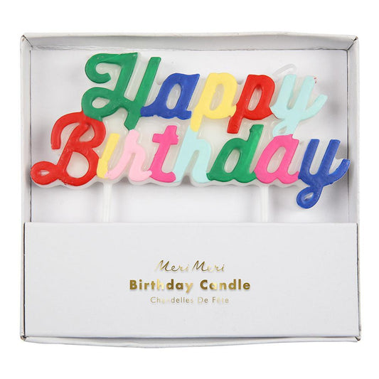Pack of multicolored candle, spelling out Happy Birthday in an elegant curling script