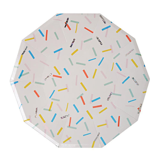 Decagon shaped white plate with rainbow sprinkles and silver foil embellishments