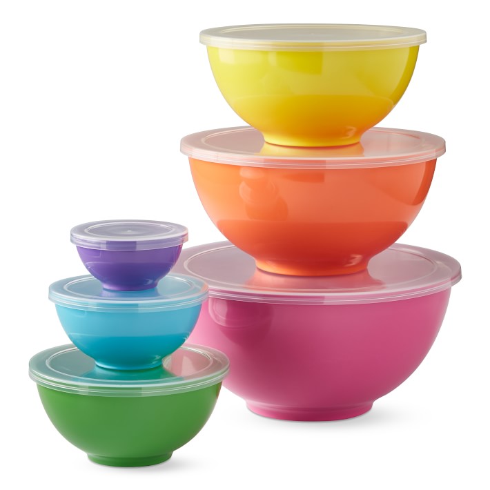 Set of six bowls and lids in graduated sizes. Includes Pink, Orange, Yellow, Green, Turquoise and Purple colors